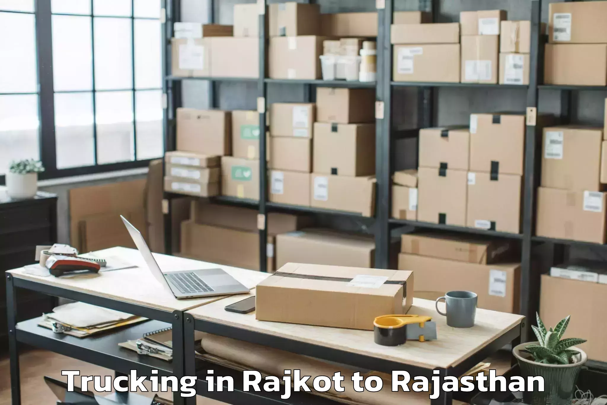 Easy Rajkot to Sagwara Trucking Booking